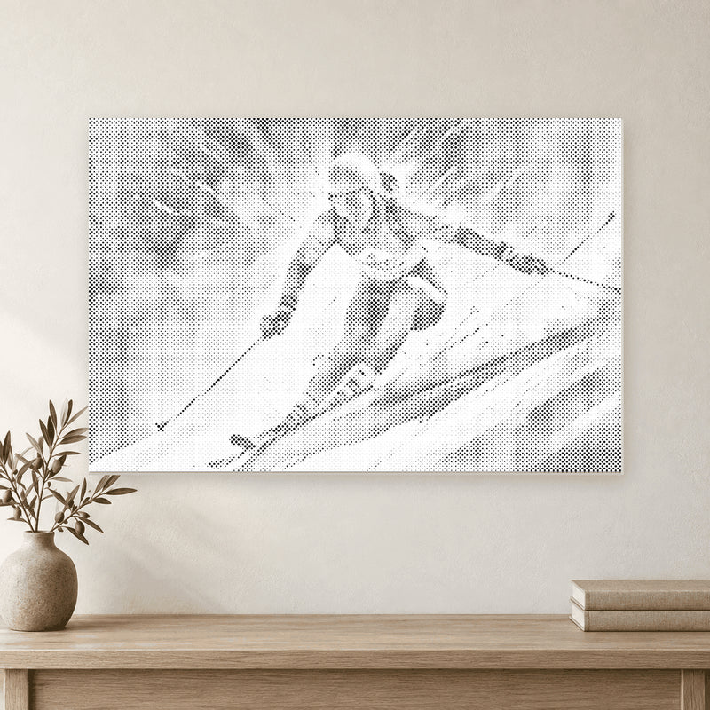 Canvas met een alpineskiër in stippen, aan een lichte muur boven een eiken sidetable.