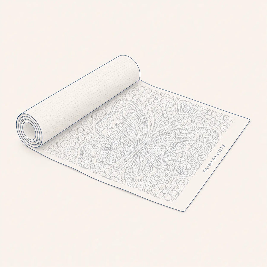 Een opgerold Paint By Dots stippelcanvas