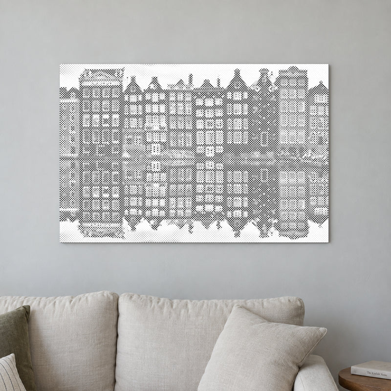 Stippenschilderij “Amsterdamse Huizen”, aan een lichte muur in een kamer met zacht daglicht.
