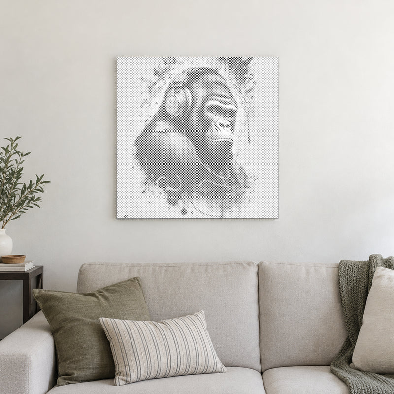 Stippenschilderij “Gorilla met Hoofdtelefoon”, aan een lichte muur in een kamer met zacht daglicht.