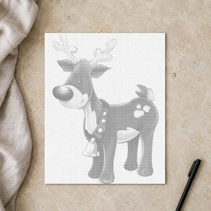 Stippenschilderij “Rudolph het Rendier met de Rode Neus”, van bovenaf op een werktafel bij zacht daglicht.